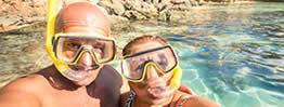 holiday makers in mask and snorkels